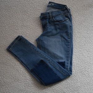 Skinny jeans with jean patches